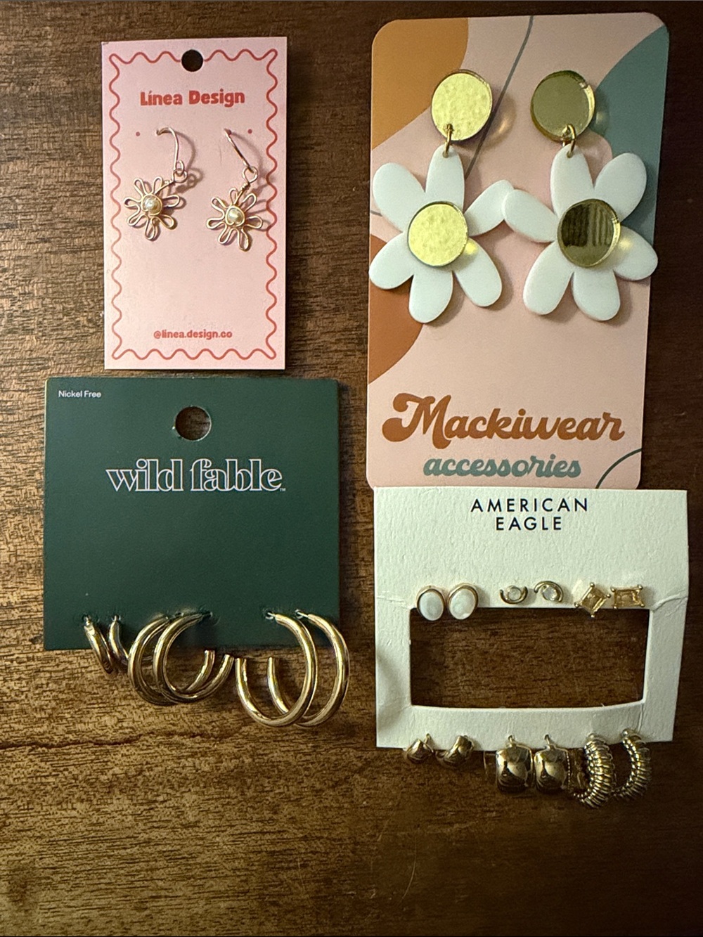 11 Pairs of Assorted Gold Earrings (Mixed - hoops, studs, dangling, floral)